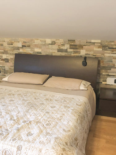 testiere letto mattoni muro